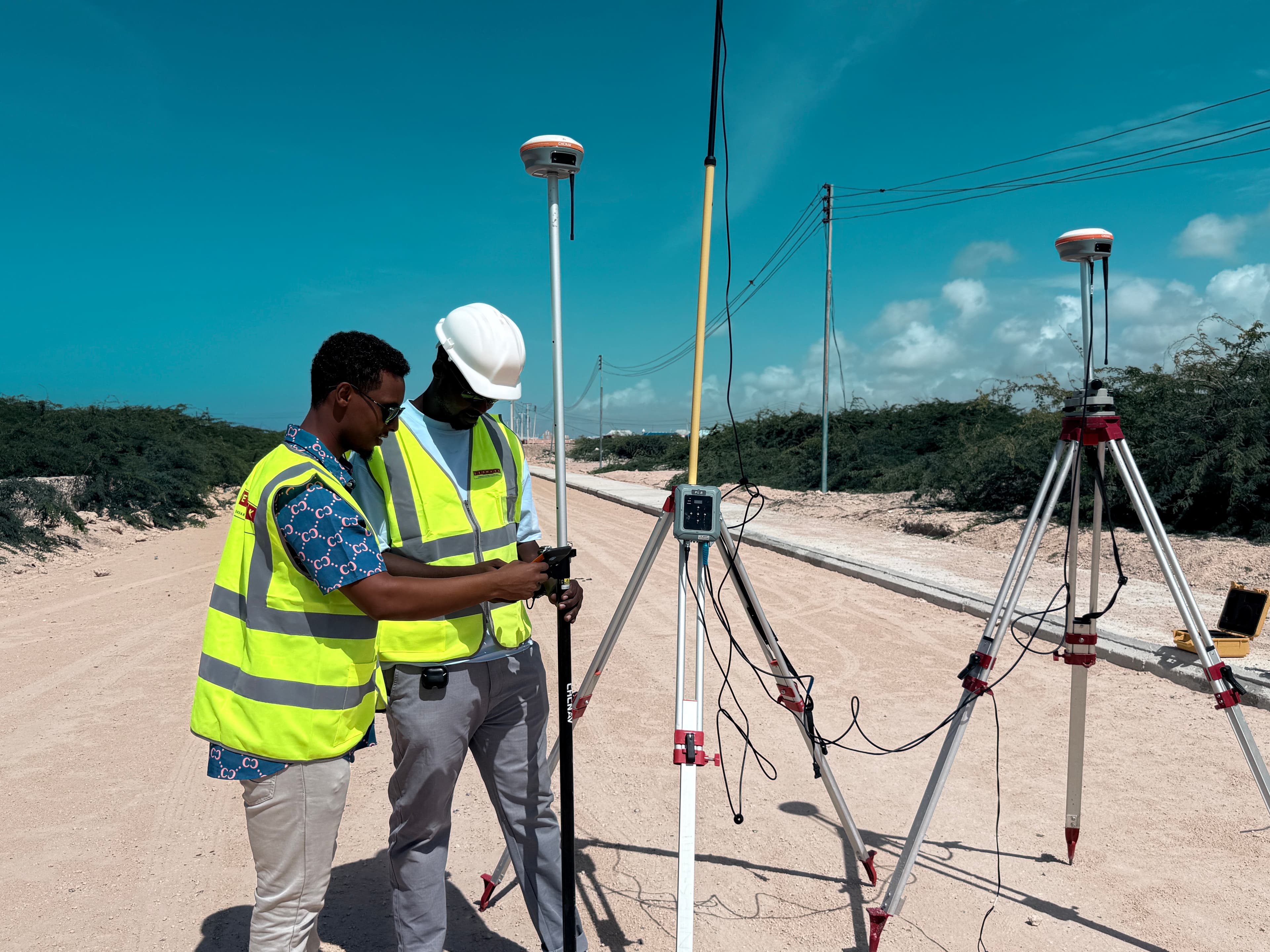 GEOMARK supervisor engineer with GNSS rover on Afgoye–Baraawe corridor